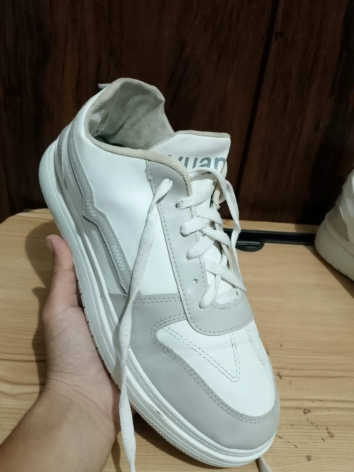 Low top sneaker, white and grey, side profile