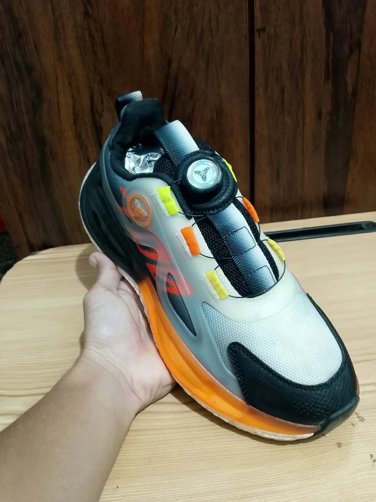 Dial closure trainer, grey and orange, side profile
